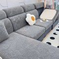 Żakardowy pokrowiec na siedzisko narożnika - monstera - DHUSAR GREY.jpeg