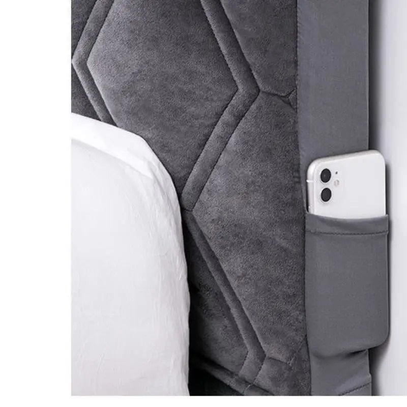 szary pokrowiec na oparcie kanapy